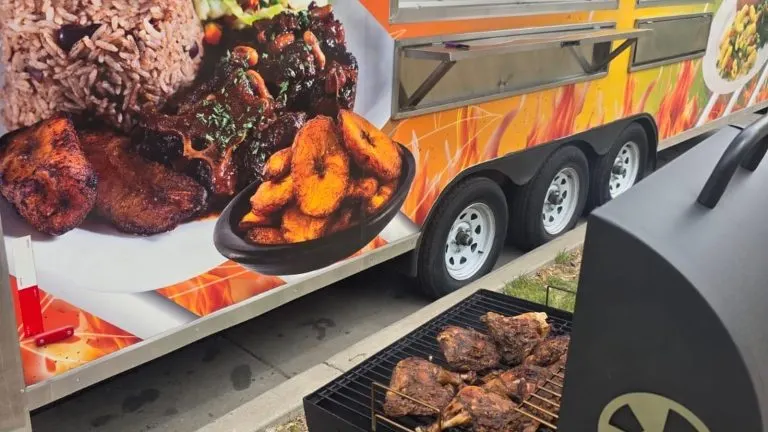 The Island Pullup food truck with the charcoal grill set up outside